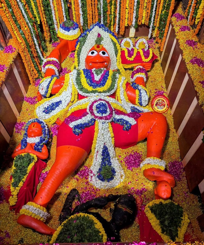 Reclining Hanuman Ji — Flower Offering